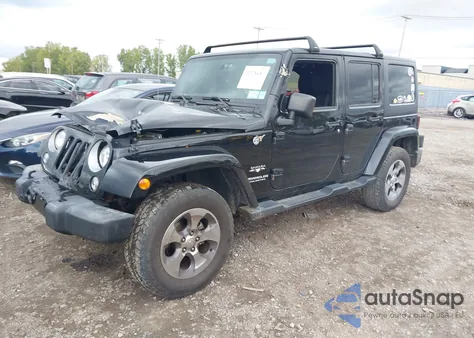 2016 Jeep Wrangler Unlimited Sahara from USA, damaged, VIN 1C4HJWEG4GL301033